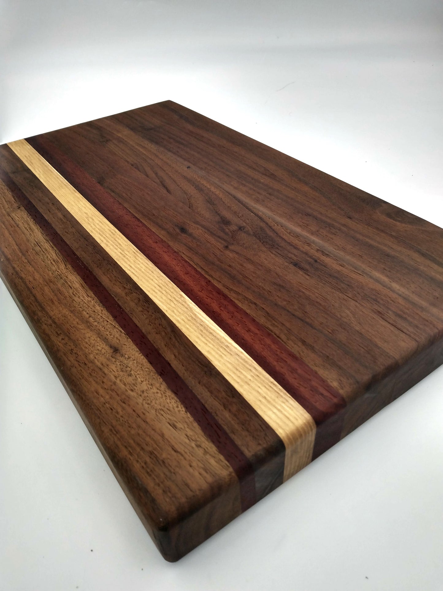 Walnut, Oak, Padauk Striped Cutting Board